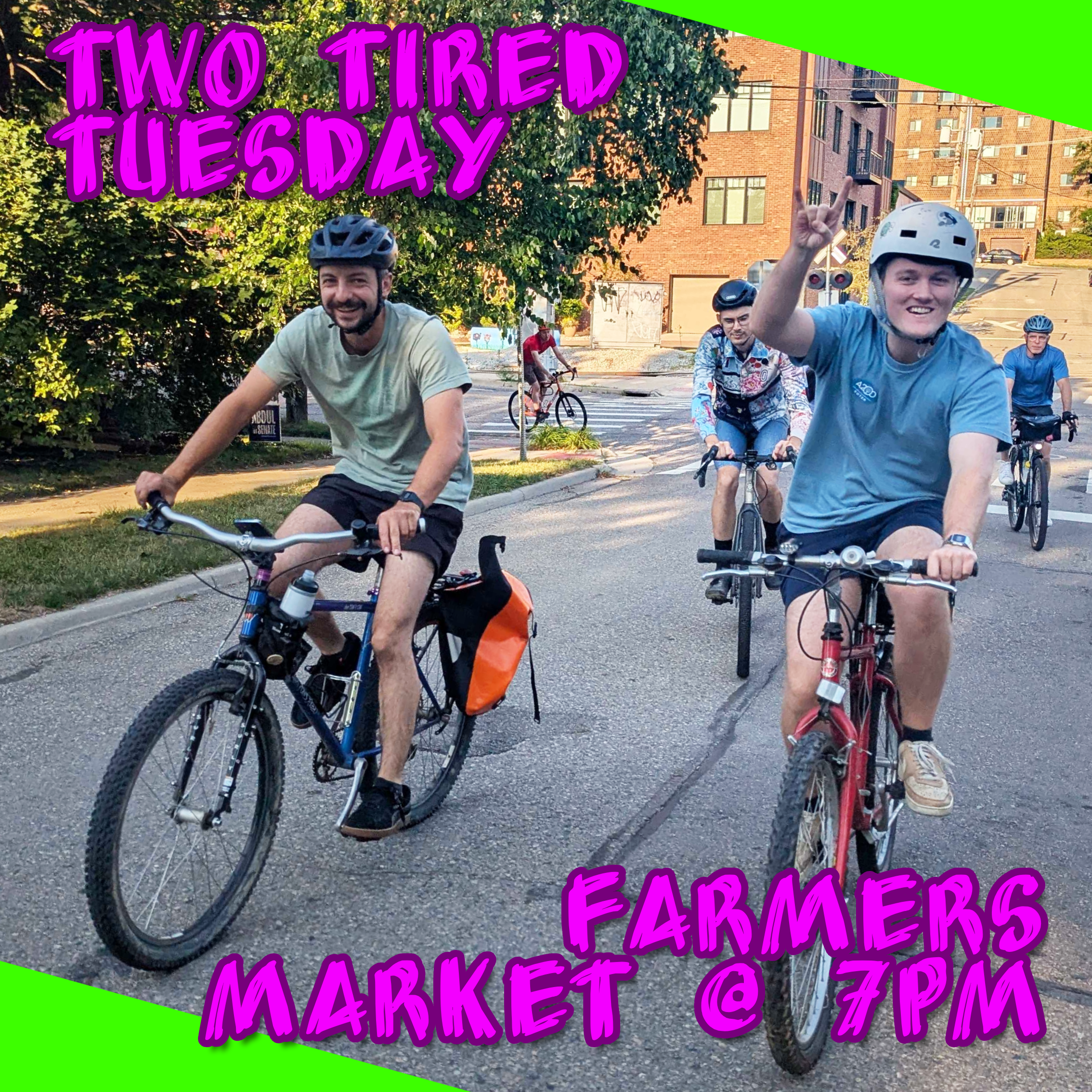 Two Tired Bicycle Club riders biking through Ann Arbor on a sunny evening